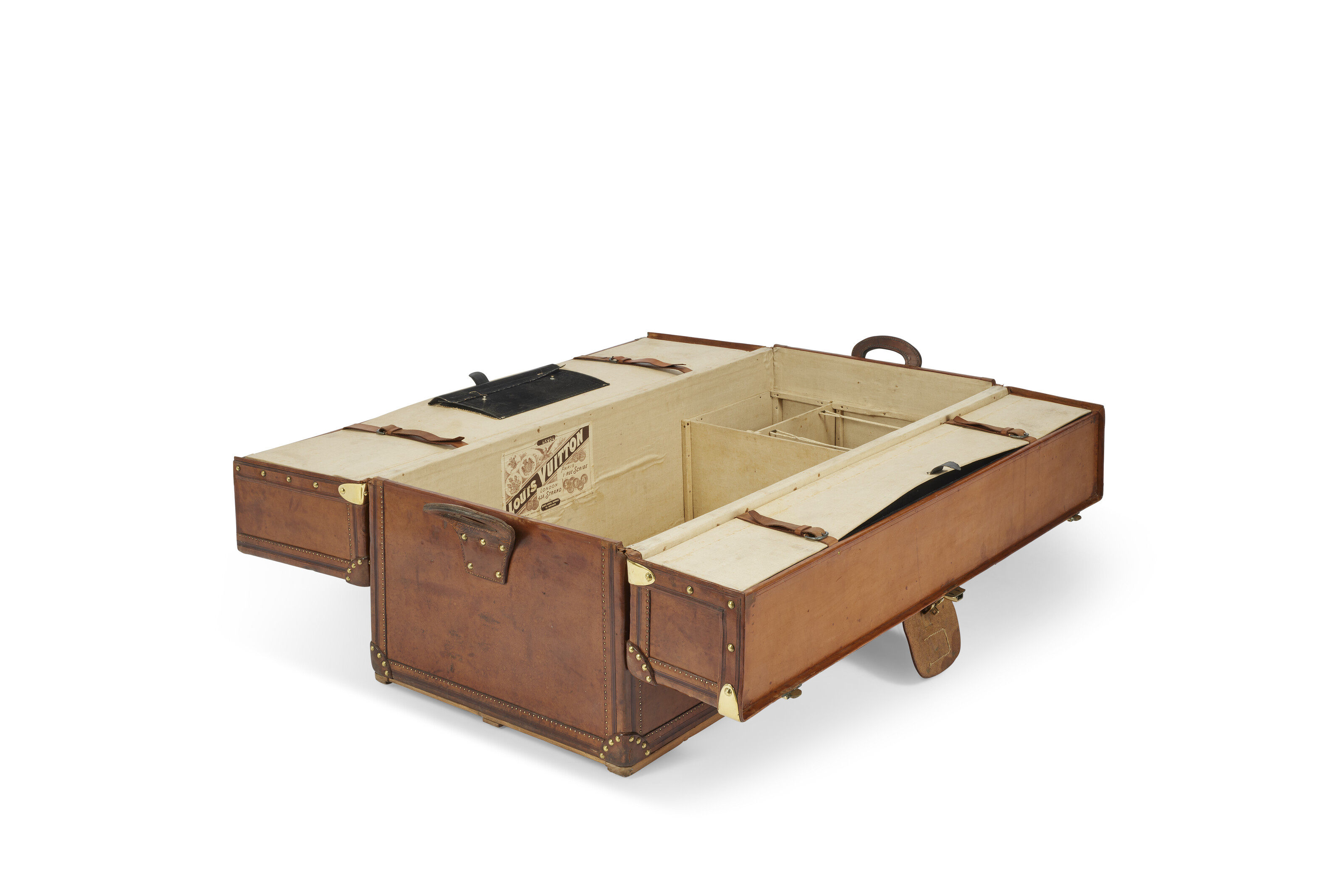 A natural cowhide leather Ideal trunk with brass hardware, Louis Vuitton, 1894, offered in Legendary trunks: A European Private Collection until 3 July 2024 at Christie's Online